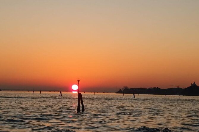Aperitif at sunset in the Venice lagoon on a private boat. - The guide factor: Pierangelo’s local routing and calm pacing