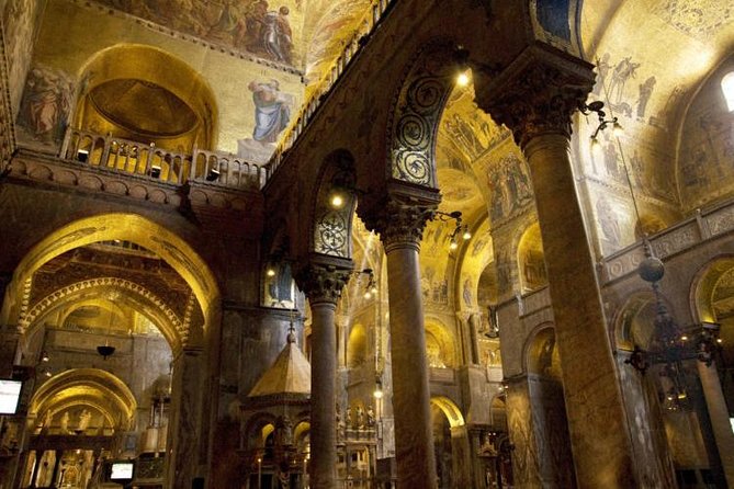 Saint Mark's VIP Night Tour: Exclusive Access Small Group Tour - Descending to the crypt: floods, damage, and scars on stained walls